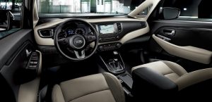 kia_carens_my17_dashboard_-_side_view_beige_interior